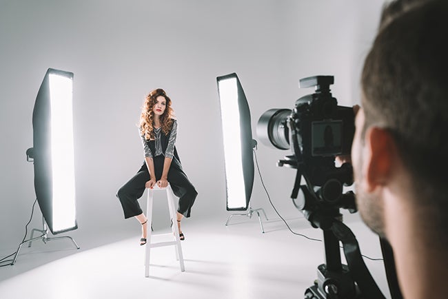 photographer and model in studio
