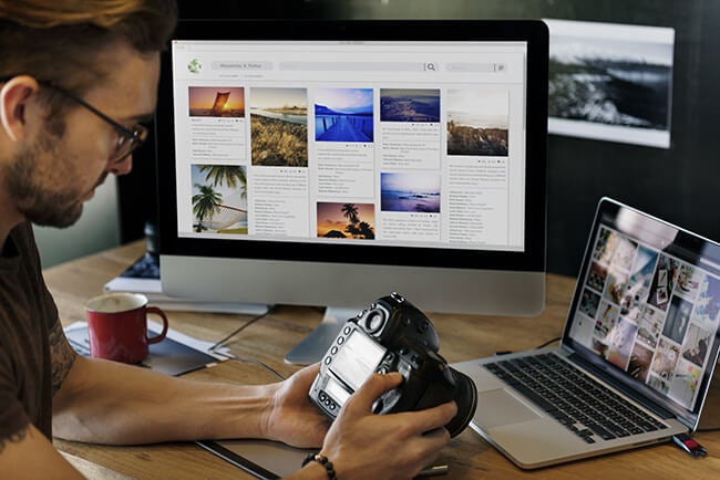 photographer at computer